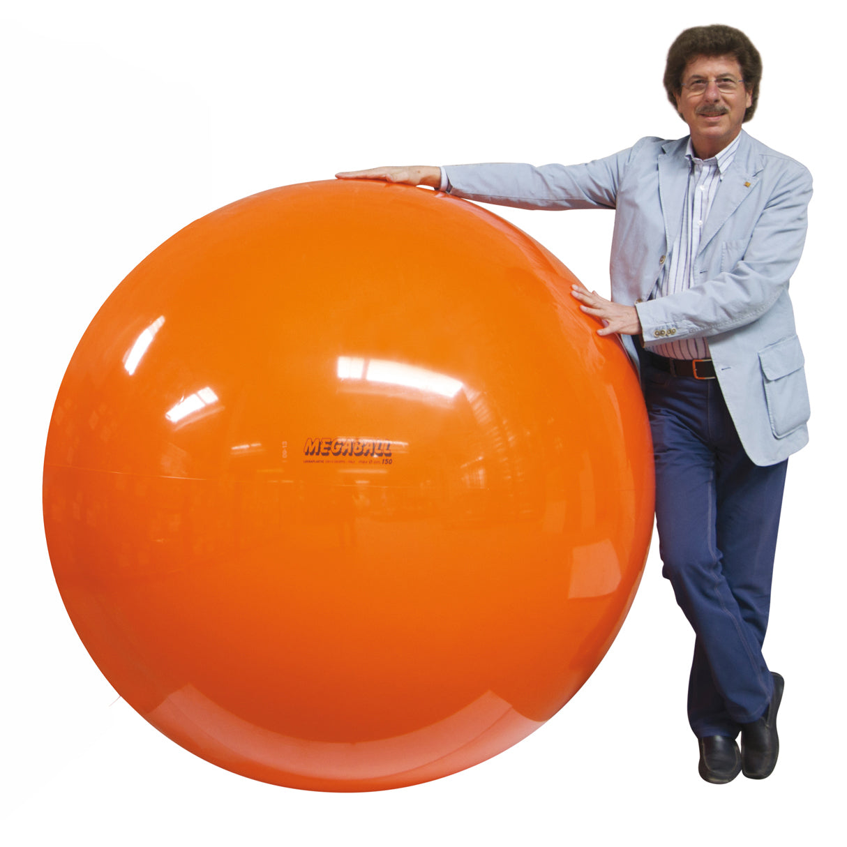 Gymnic company owner standing next to an orange megaball